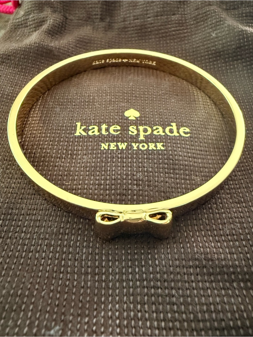 kate spade gold-tone bow bangle bracelet